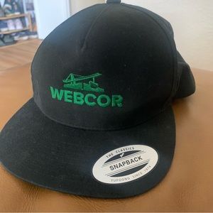 Black snapback hat with logo embroidery